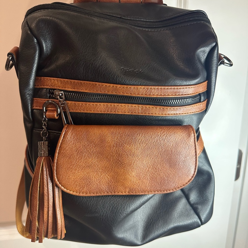 Black and Brown Leather Opage women’s backpack/purse